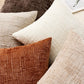 Soft chenille pillow cover in a single solid tone, its tufted crosshatch weave catching the light on the surface