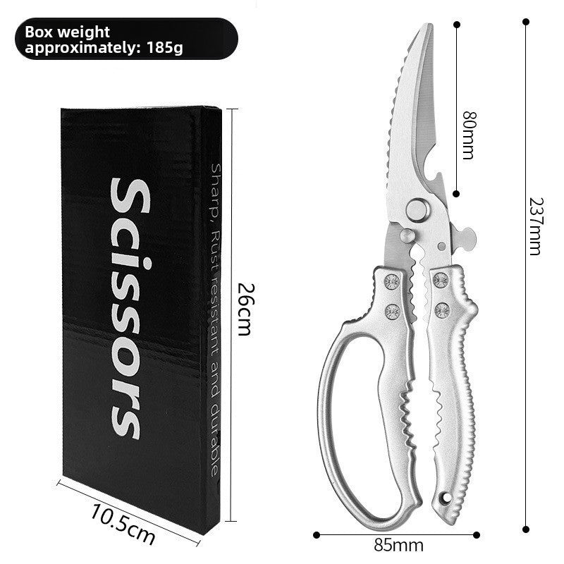 Silver handled kitchen bone shears beside a black gift box