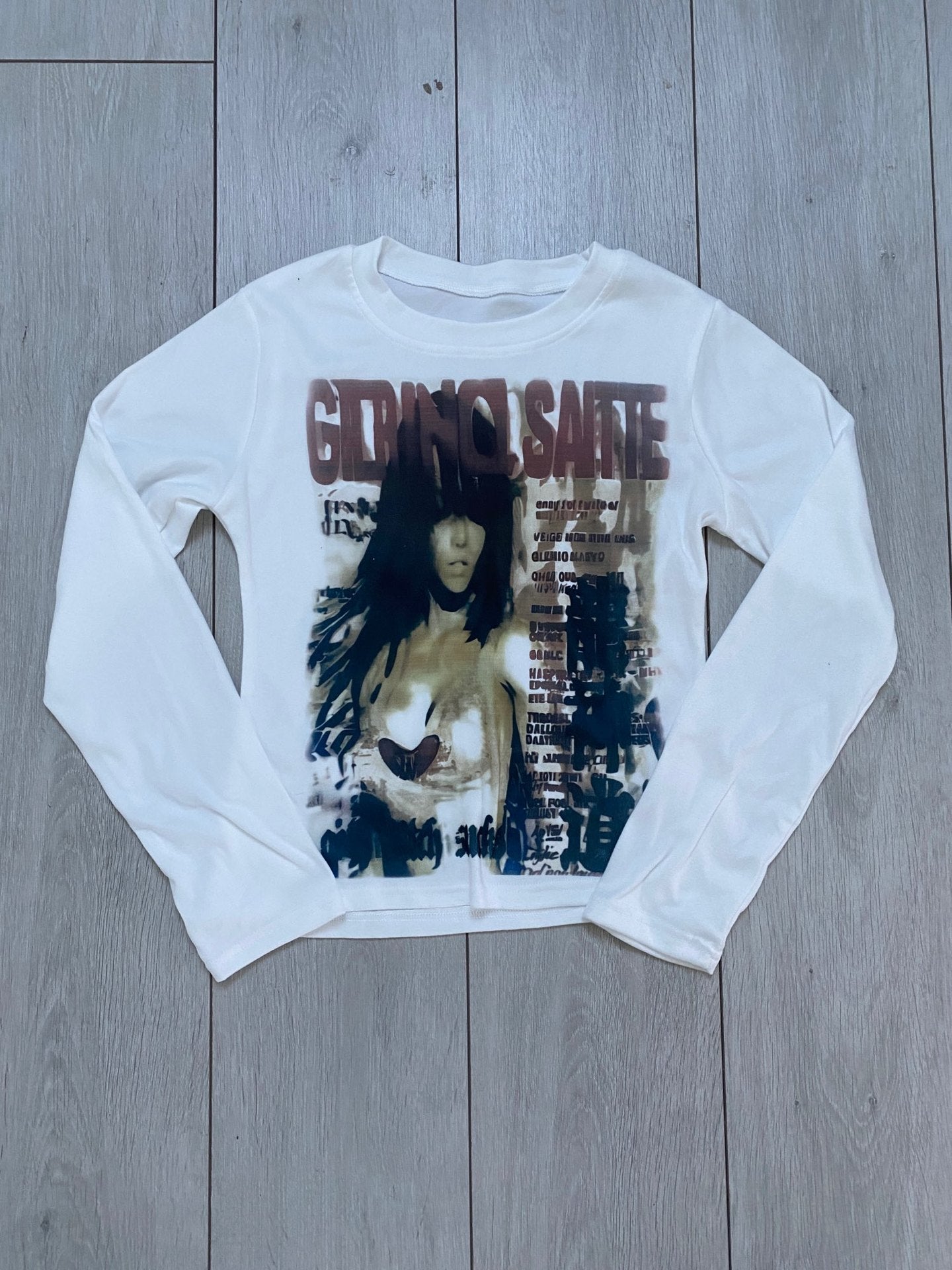 Long sleeve graphic tee with a round neck and a manga style front print
