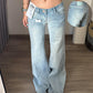 Light wash low rise flared jeans with back pocket inset, image for Small size model option in size L