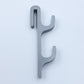 Gray resin single sided double hook with two arms stacked, seen from the front on a light background