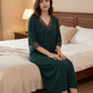 Lace trimmed nightgown laid flat to show the full length and lace hem