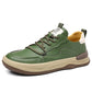 Single green low top sneaker in profile, stitched midsole edge and gum toned outsole