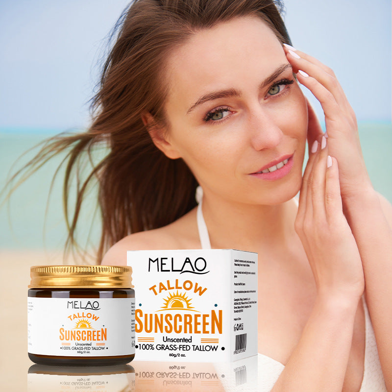Close up of light beef tallow sun cream texture on skin
