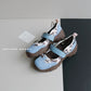 Sky blue platform slip-on shoes with a blue strap, patterned panels and a brown lug sole, EU size 42 option