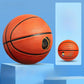 Classic orange kids basketball with deep black seam lines on a bright studio block
