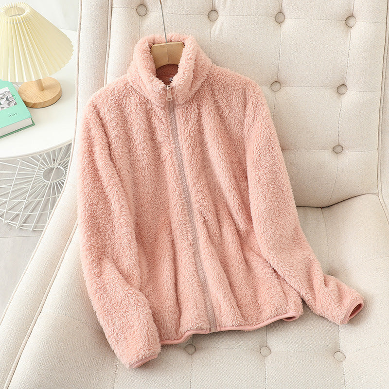Loose fit plush fleece jacket with a full length zip and stand collar folded to show the nap