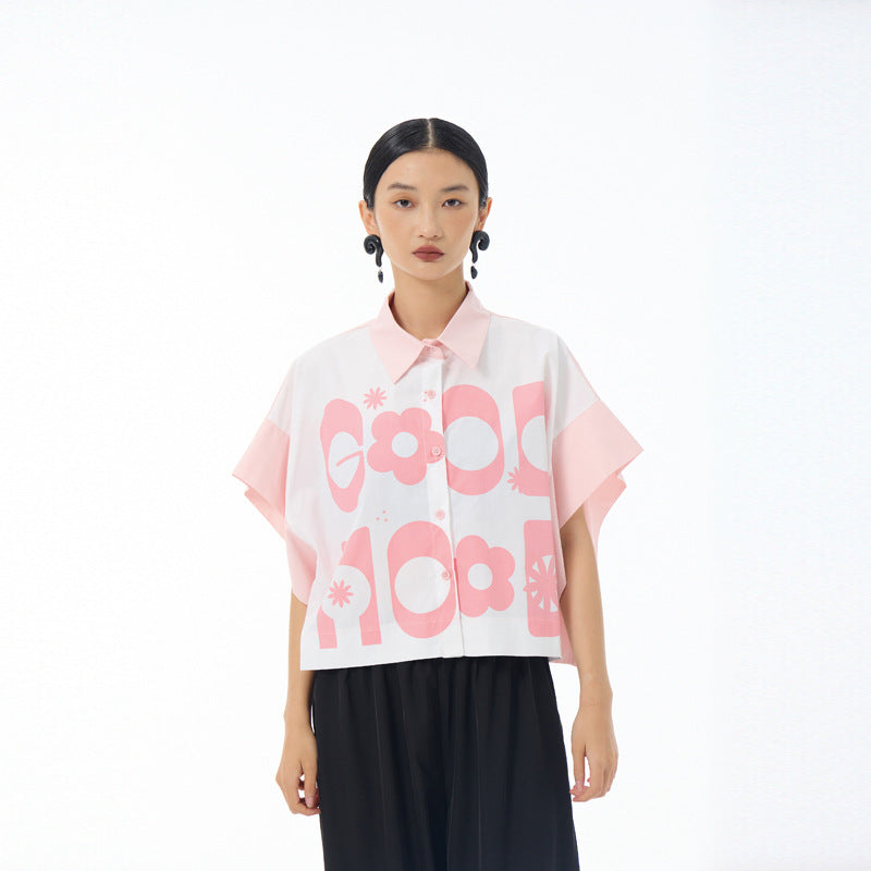 Soft pink and white cropped button up shirt with daisy and letter print