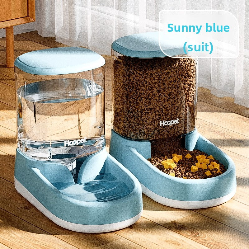 Cat eating dry food from the bowl of a gravity pet feeder