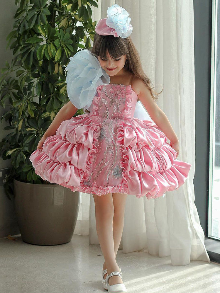 Close up showing skirt volume on the princess bow dress