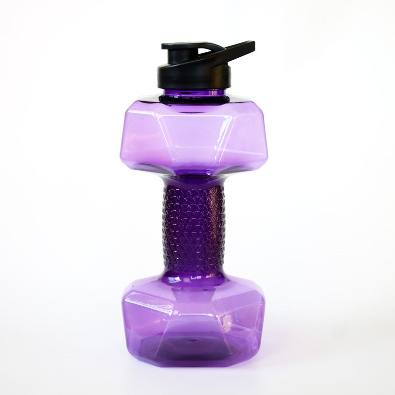 Clear dumbbell bottle empty and upright showing the wide screw mouth under the cap
