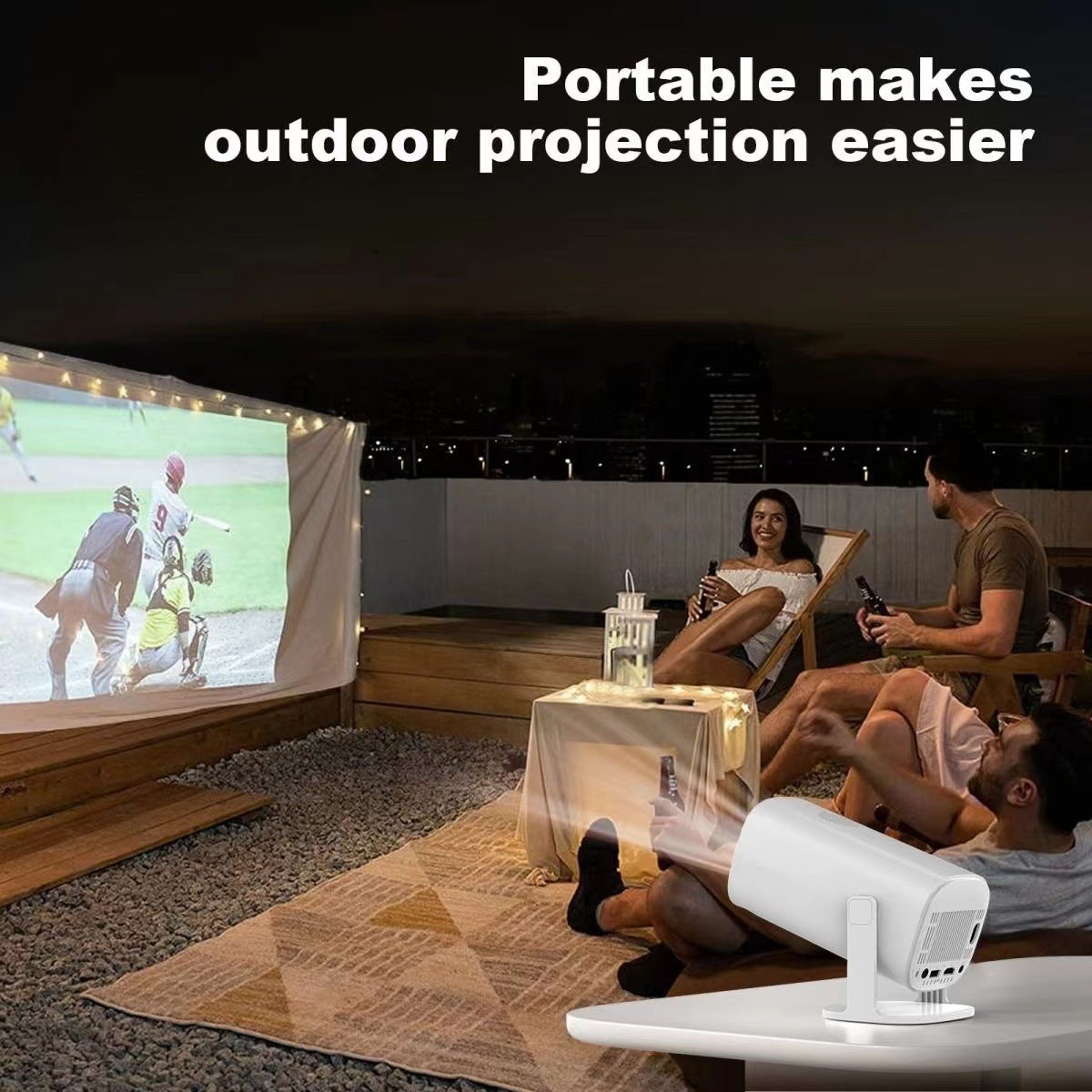 People on lounge chairs on a patio watching a projected sports match, caption portable makes outdoor projection easier