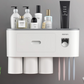 White bathroom organizer with an open top tray holding bottles, a comb and a razor