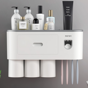 White bathroom organizer with an open top tray holding bottles, a comb and a razor