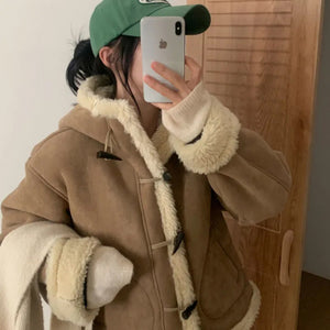 Side view of khaki sherpa lined jacket showing the hood, cream front trim and turn back sherpa cuffs