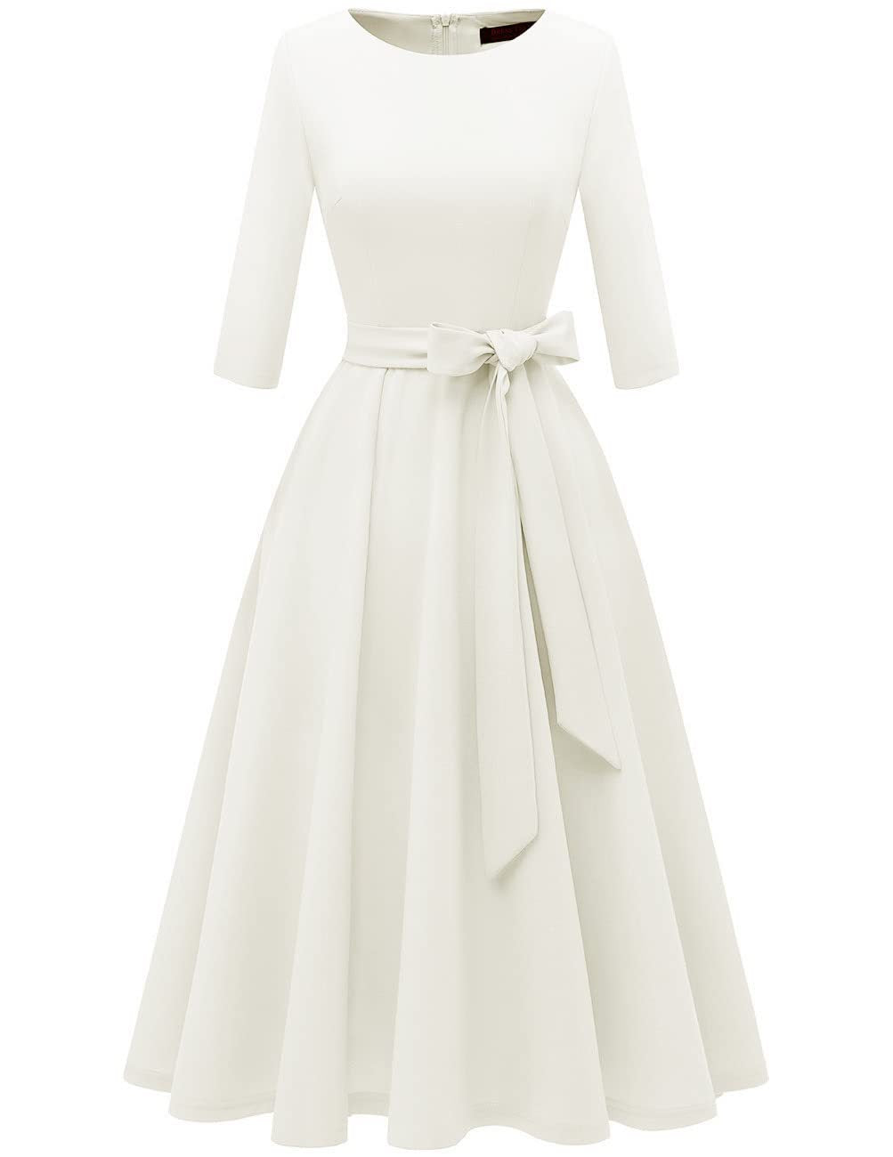 Fitted vintage swing dress with tie belt knotted into a bow at the marked waist