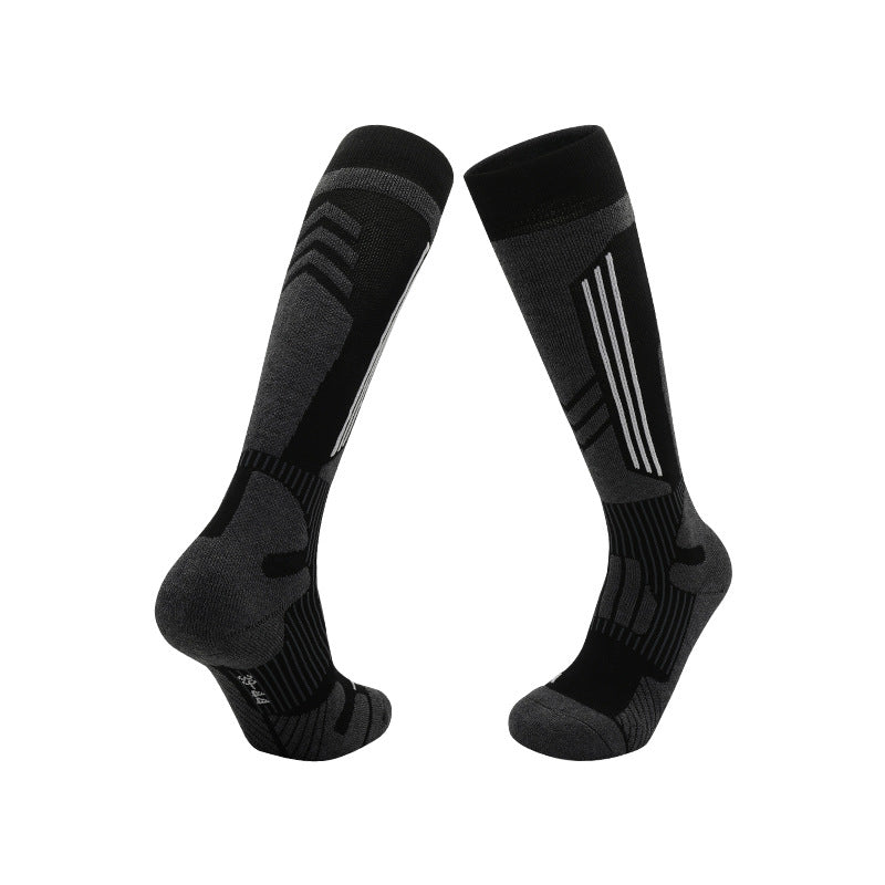 Warm knee high ski socks in a merino wool blend with a cushioned sole, colourway pair