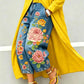 Wide leg cropped denim jeans with large pink peony and yellow blossom print, yellow coat and heels