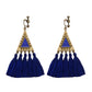 Handmade bohemian clip-on earrings with tassel and bead drop detail, zinc alloy frame, studio shot on white background