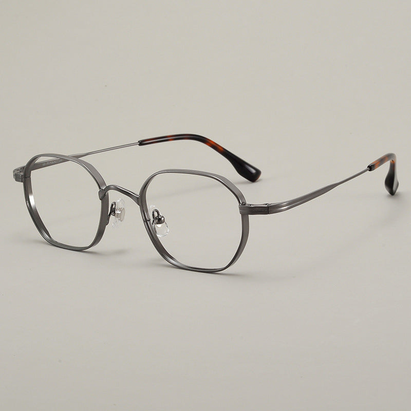 Angled hero shot of the titanium eyeglasses frame showing front and temples