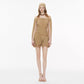 Khaki off shoulder ruched mini dress worn for an evening out