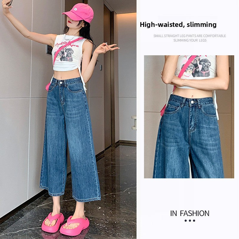 Off-white high-waisted wide-leg jeans full outfit with straw bag and hat