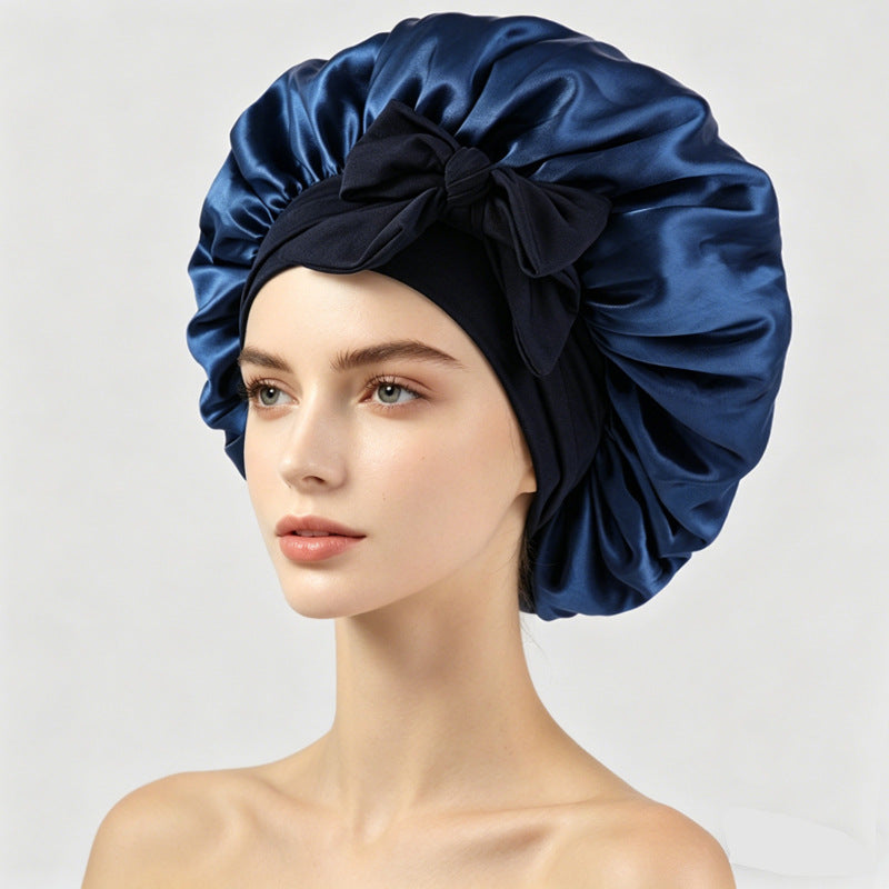 Satin sleeping bonnet with a smooth shiny face and a soft stretch band at the edge