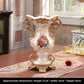 Vintage resin home decor with cream pearl shell inlay panels and molded gold tone European detailing