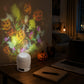White projector light on a desk throwing pumpkin and ghost patterns on a wall, Halloween rechargeable model