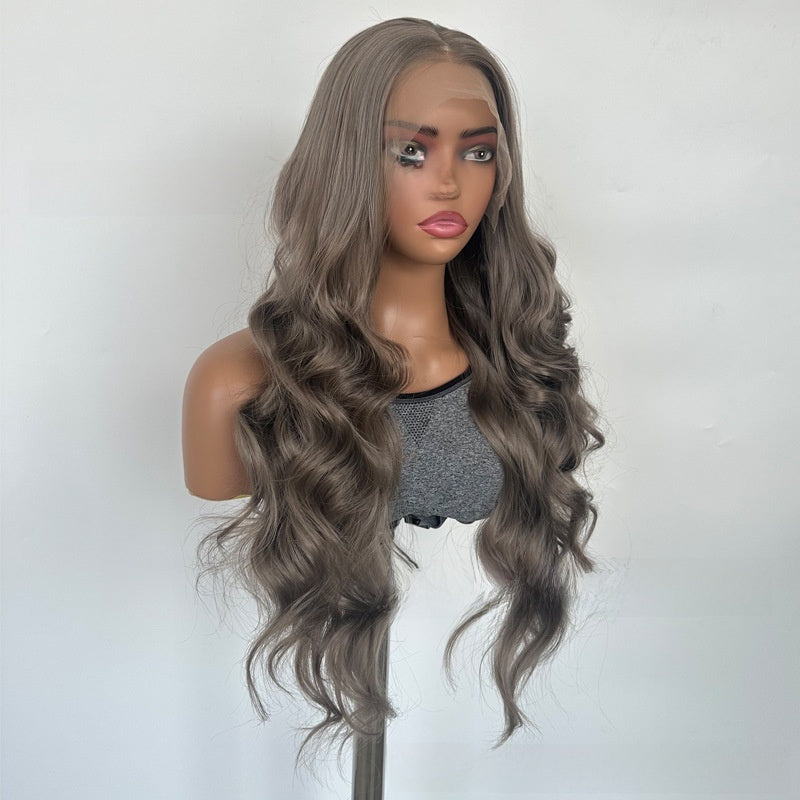 Side view of a long wavy gray brown lace front wig with loose waves falling past the shoulders