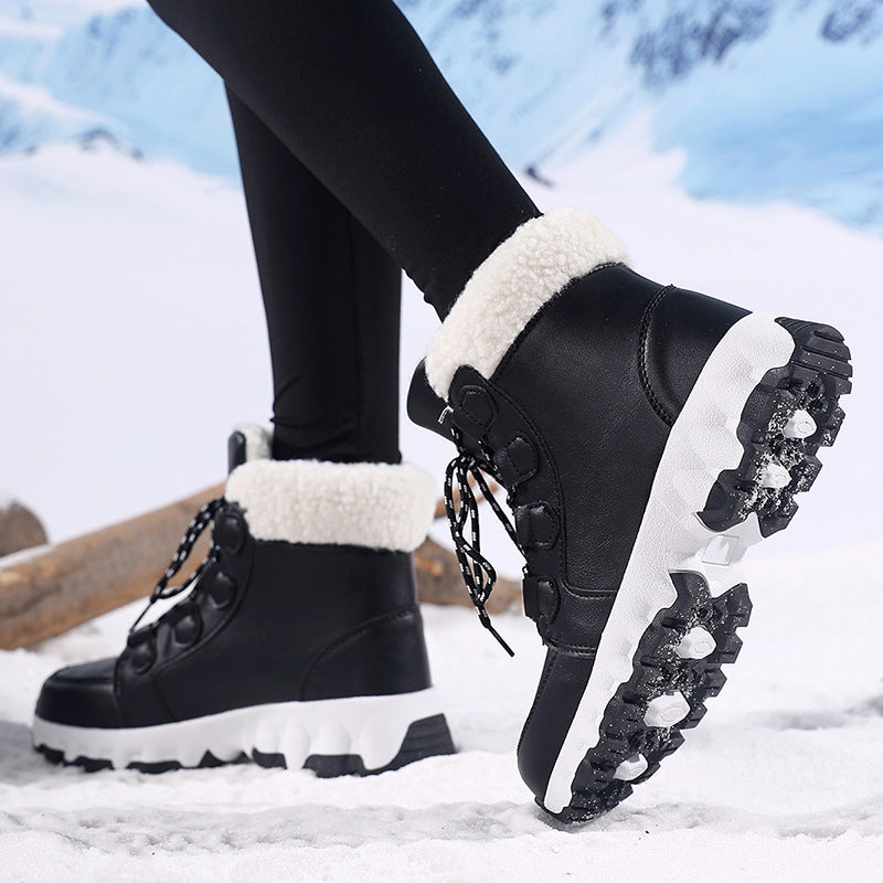 Winter snow boot with folded white plush collar, speckled laces and a thick lug sole