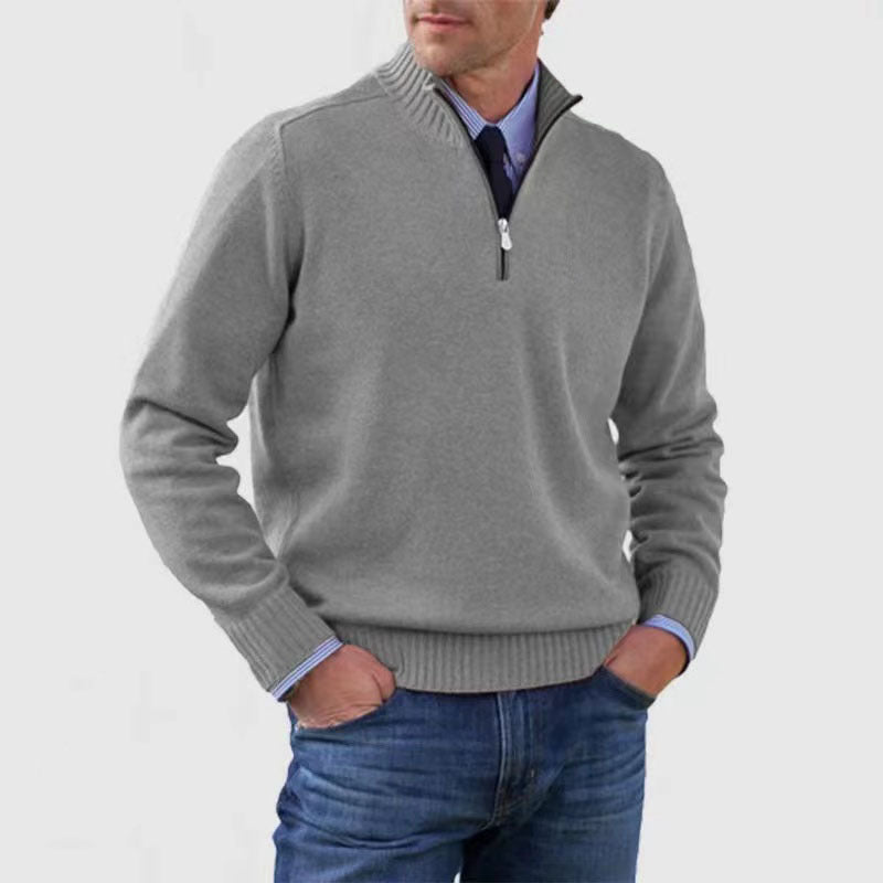 Light gray mens acrylic knit quarter zip stand collar pullover sweater worn by a standing male model