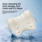 Ivory foam neck pillow with raised nodes splashing in water to show the rinse clean surface