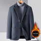 Gray suit jacket detail of the notch lapel and topstitched edge