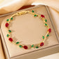 Zircon Gold Plated Leaf Design Bracelet | styled flat lay overhead shot