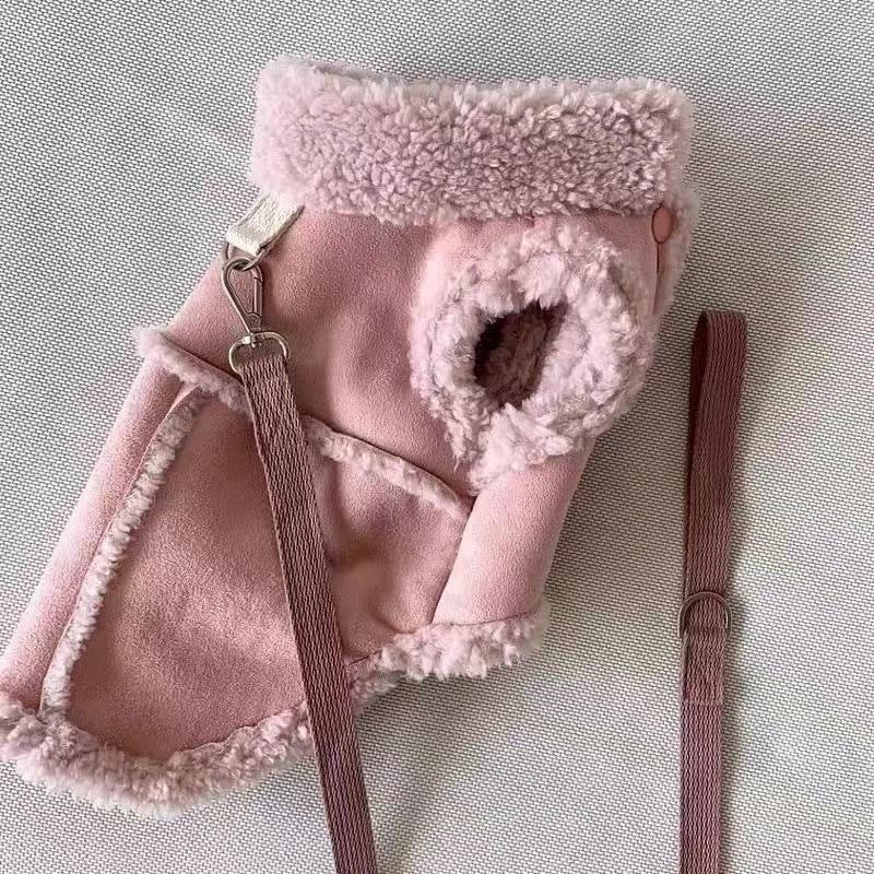 Brown faux suede dog vest with curly sherpa lining shown from the inside