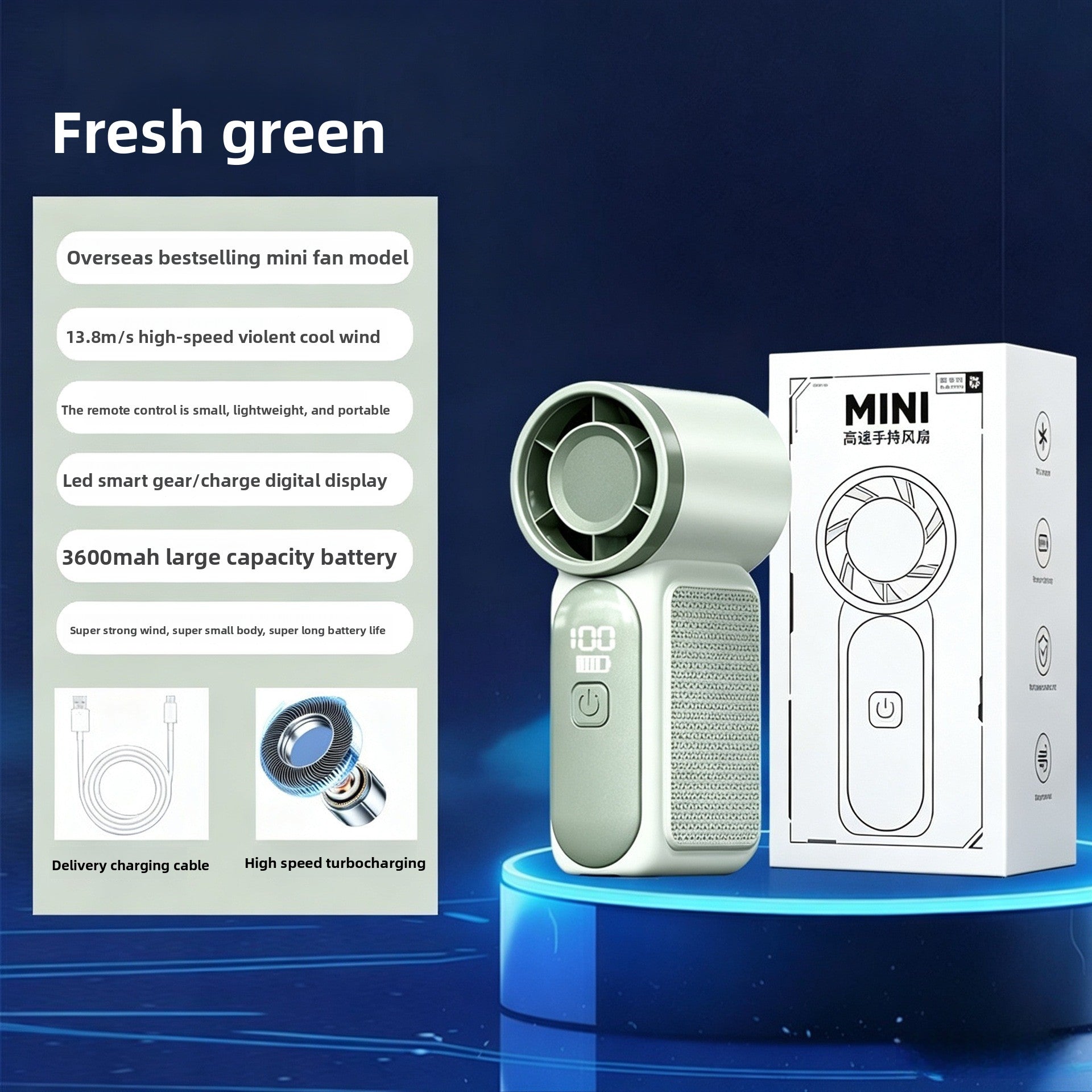 Green handheld turbo fan next to its box and USB charging cable