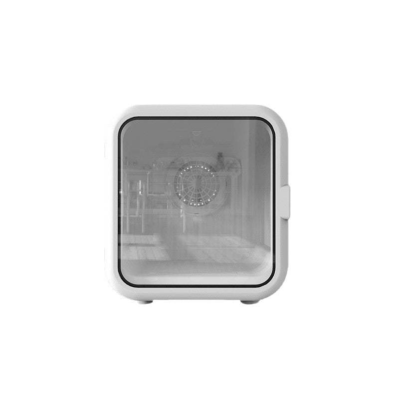 Front view of the white cube pet drying box with a tinted door and the internal fan showing