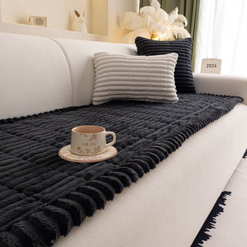 Sweet Serene Black quilted plush sofa cover on a sofa, 90 x 120 cm
