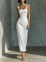 Wearer pairs dress with low boots for Monday meeting