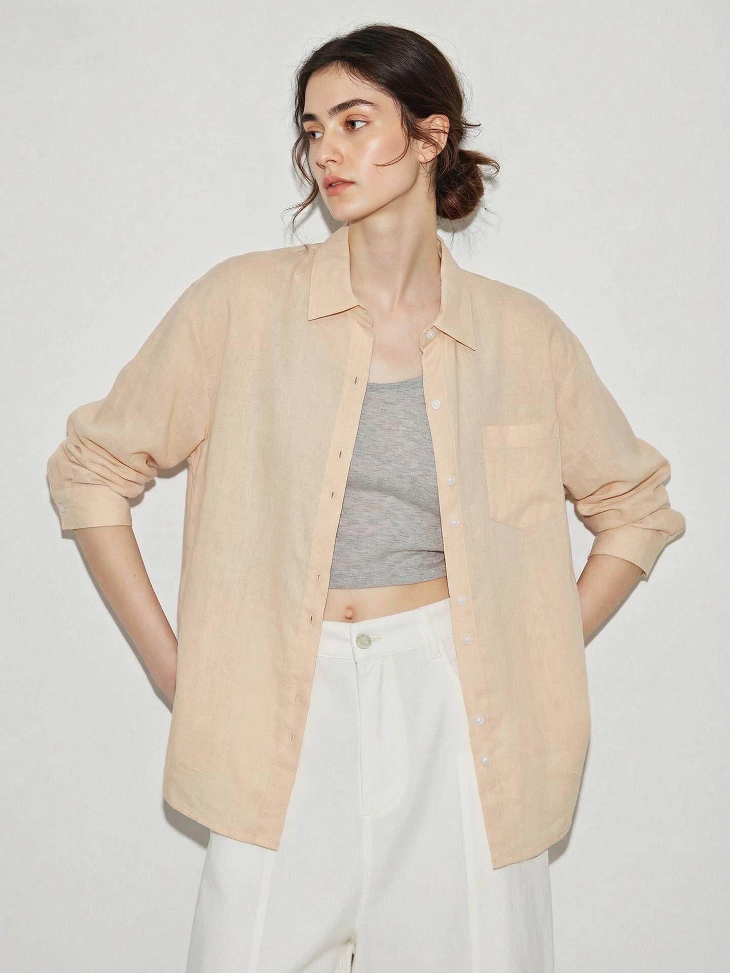 Flat lay of a solid colour linen blend button-up shirt with chest pocket and full button placket