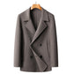Camel toned double faced wool overcoat shown flat on a hanger, double breasted front view