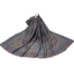 Dark navy paisley shawl with a teal and gold border laid out on a white background