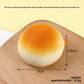 Top view of the simulated bread squishy showing its realistic baked shape