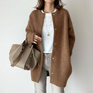 Side profile of the brushed knit cardigan showing the ribbed cuff and sleeve