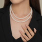 Sterling silver round bead necklace seen from the side, polished bead on a thin chain