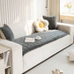 Sweet Serene Dark Gray quilted plush sofa cover on a sofa, 90 x 120 cm