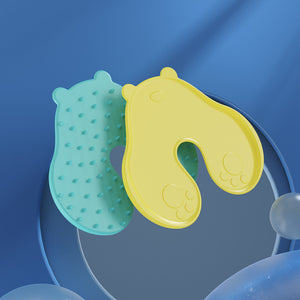 Mint green and yellow bear pads showing the raised contact point face and the smooth paw print face