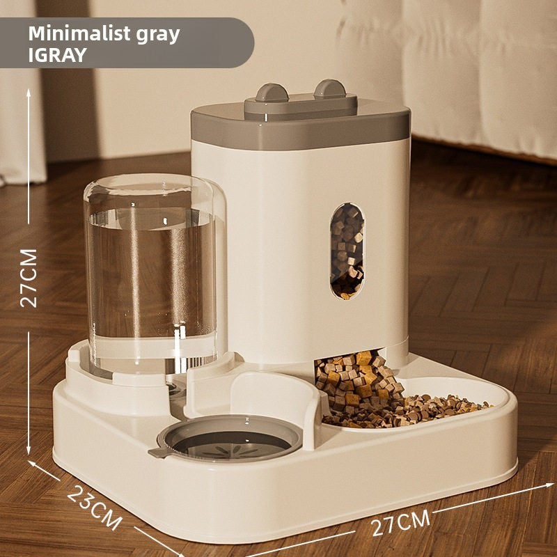 Clear water bottle of the pet dispenser seated in its cradle above the raised drinking bowl