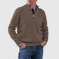 Brown mens acrylic knit quarter zip stand collar pullover sweater worn by a standing male model